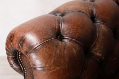 brown-leather-chesterfield-sofa-armrest